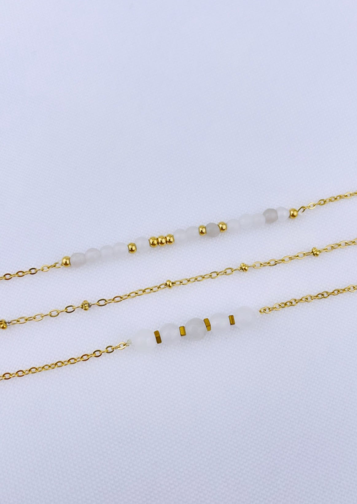 PURITY - Ensemble de bracelets dorés et pierres naturelles blanches