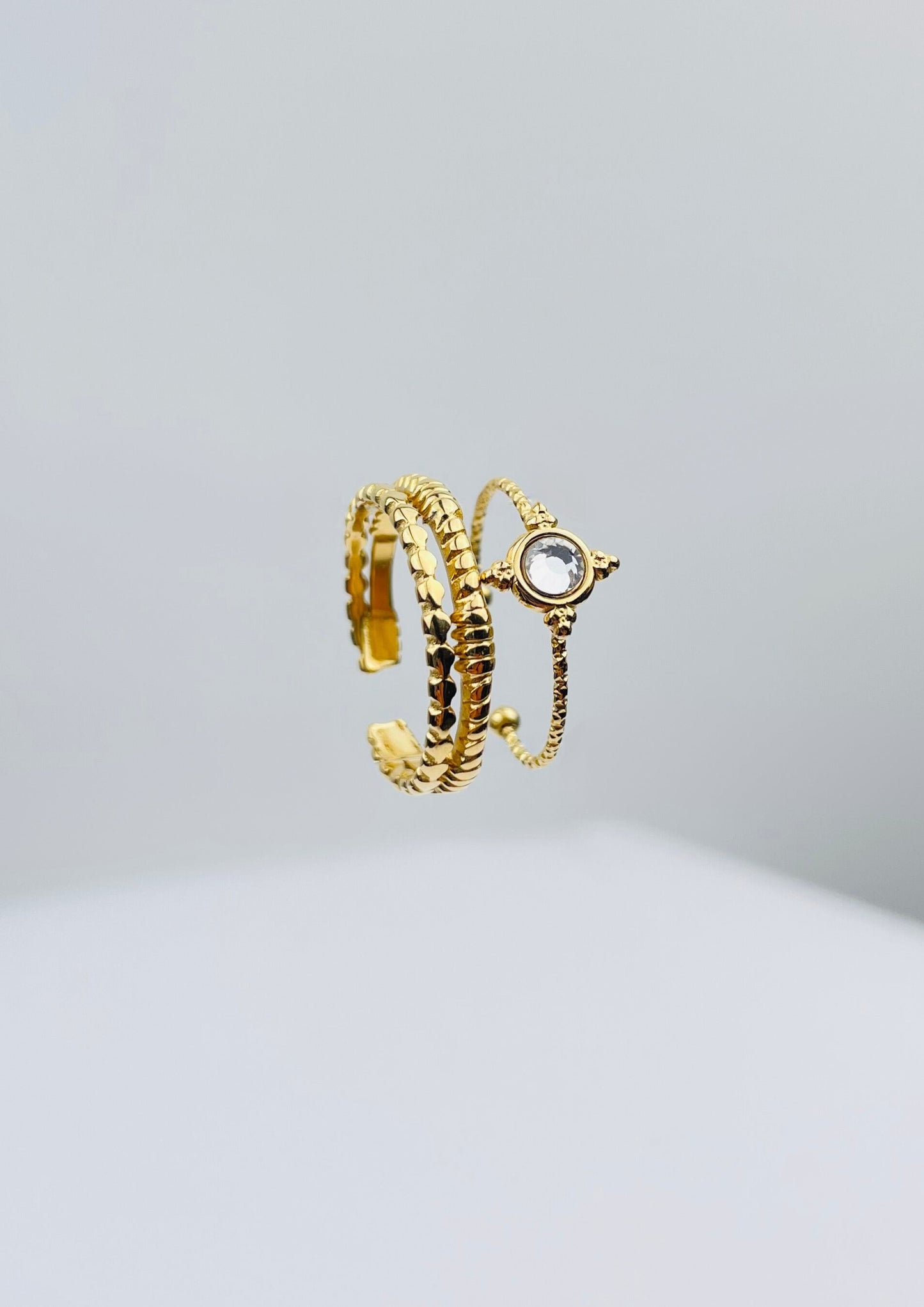 MANEL - Bague dorée doublée et surmontée d'un strass