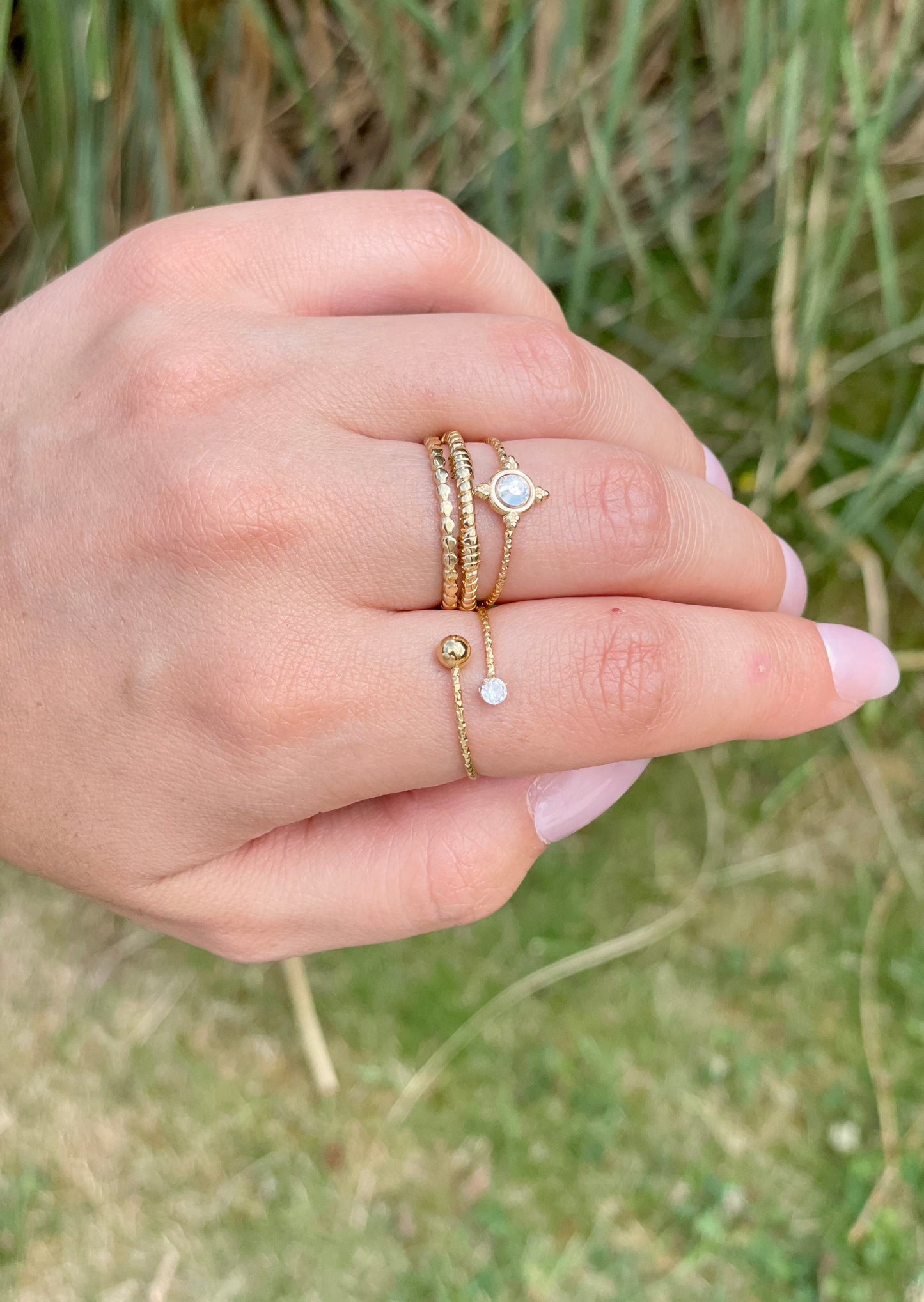 MANEL - Bague dorée doublée et surmontée d'un strass