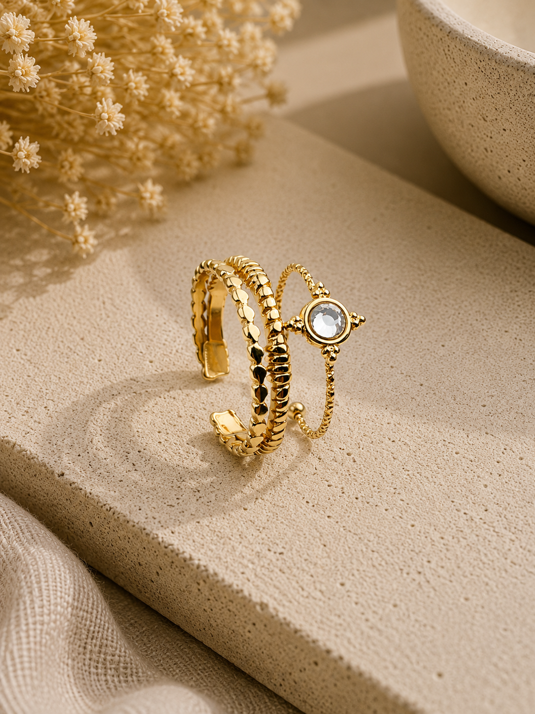 MANEL - Bague dorée doublée et surmontée d'un strass
